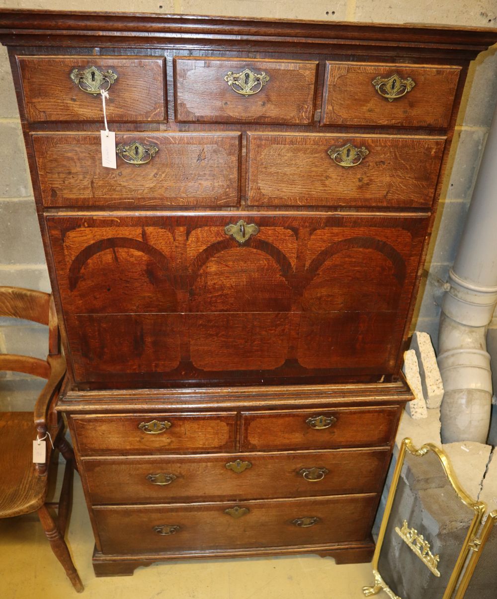 A mid 18th century oak secretaire chest on chest, W.96cm, D.52cm, H.164cm